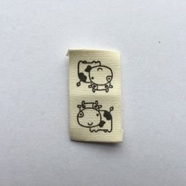 Naszywka materiałowa 2,0x3,5 cm Krowy